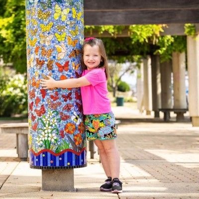Lila at the Wings Mosaic Mural, Fitton Center