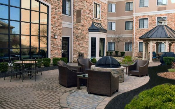 Image file StaybridgeSuitesExteriorFirePit_15285FFE-9A61-1580-F792C1DE11A918A7-15285e8fa373b20_15286885-ae66-ecbf-3d0a6f9344bcedac.jpg